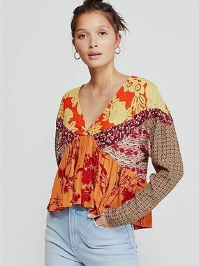 Free People Aloha State Of Mind
Tangerine Peplum Top